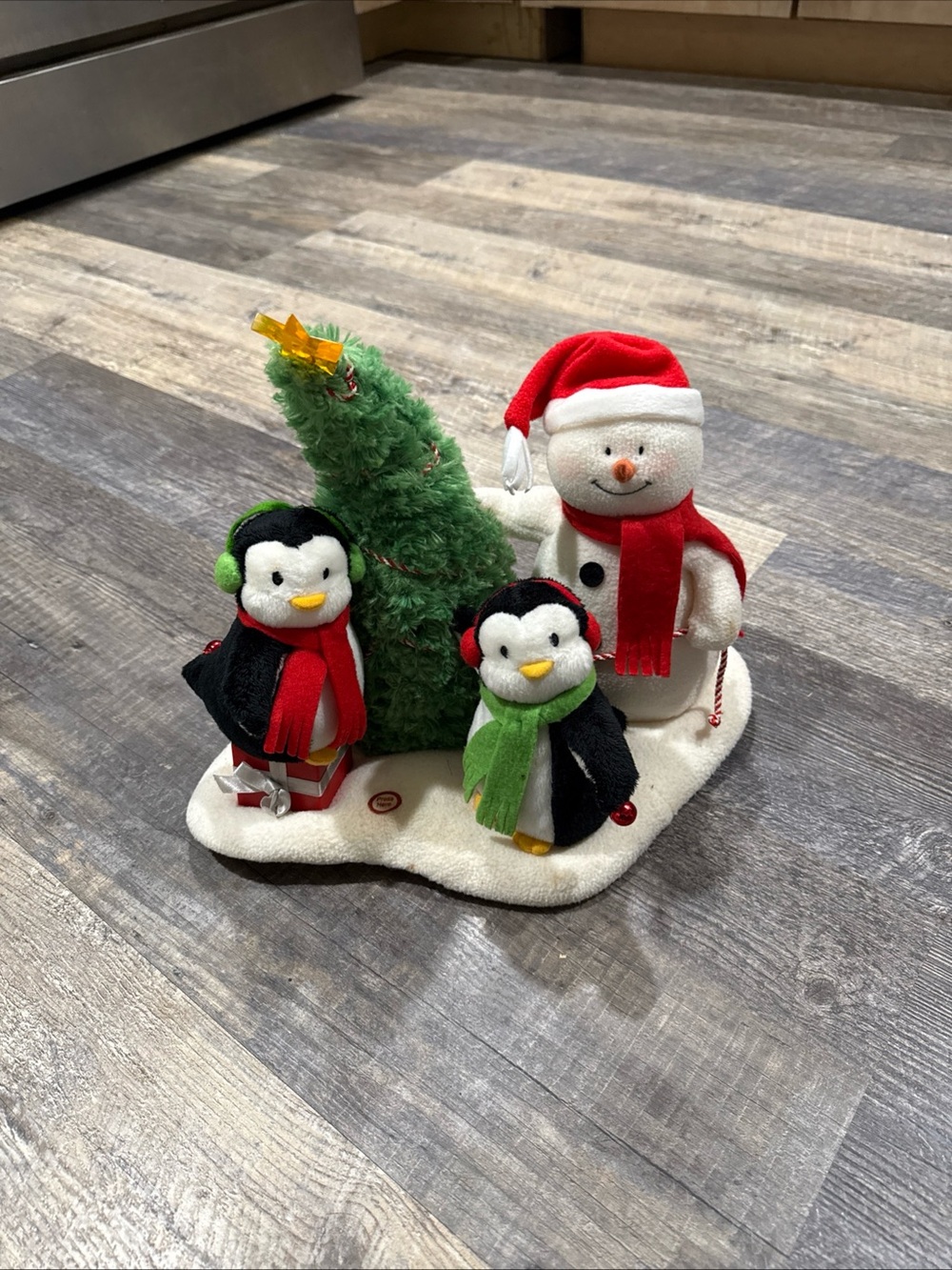 Hallmark White musical Snowman and Penguin Trio with Green Tree